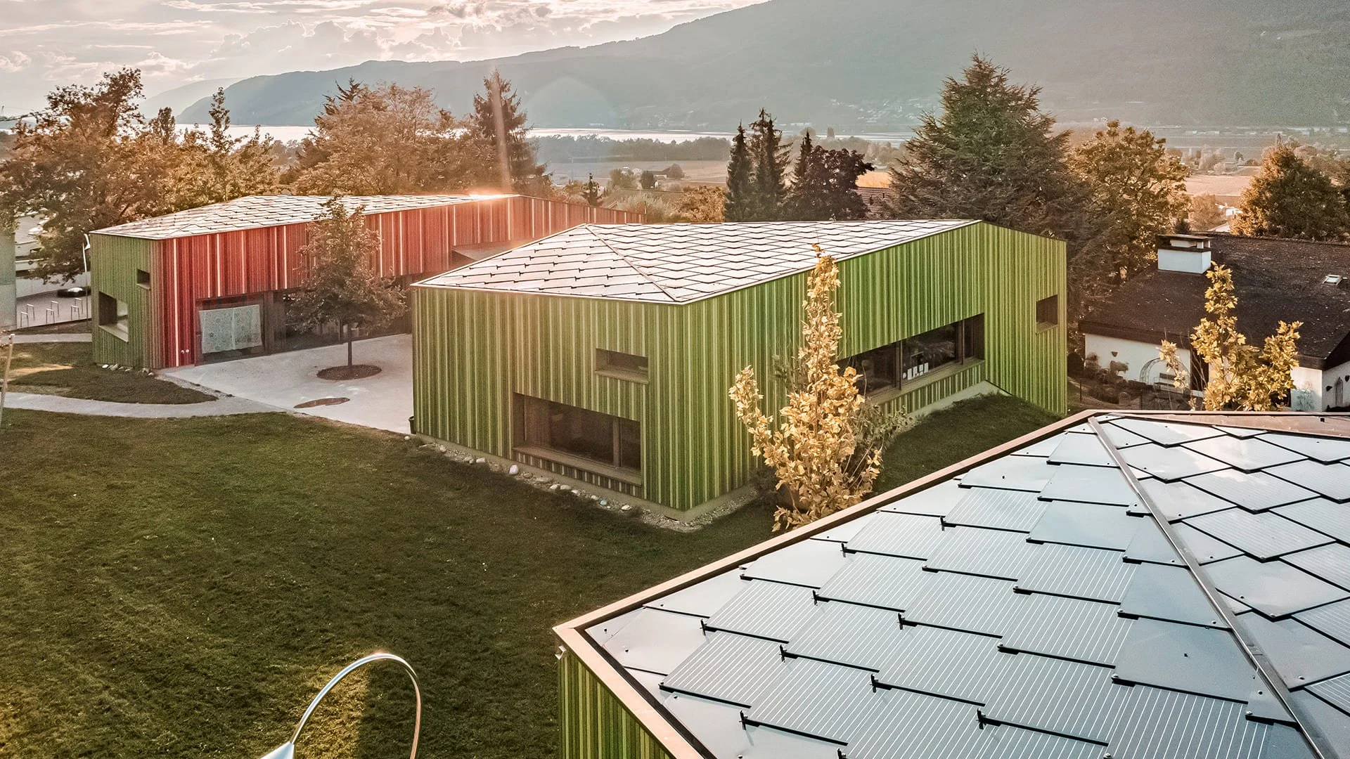 SunStyle solar tiles on a educational campus with low pitch roofs