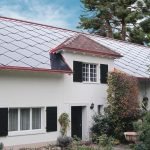 SunStyle solar tiles on a single family residence to create an eco-friendly home by adding a solar roof
