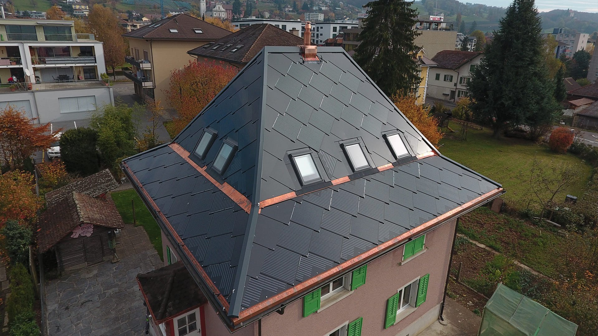 SunStyle Photovoltaic shingles on solar roof at swiss residence