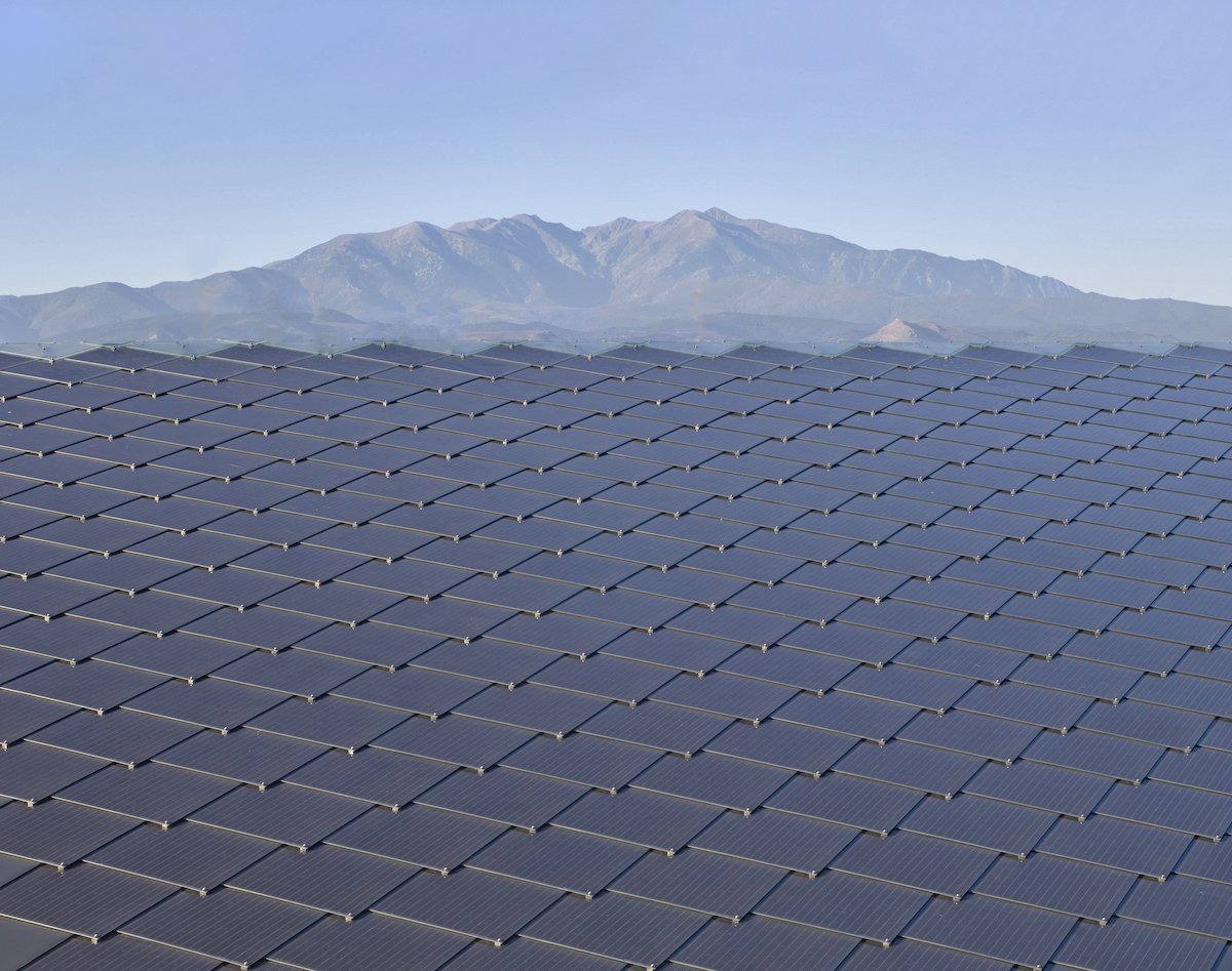 How do solar shingles work