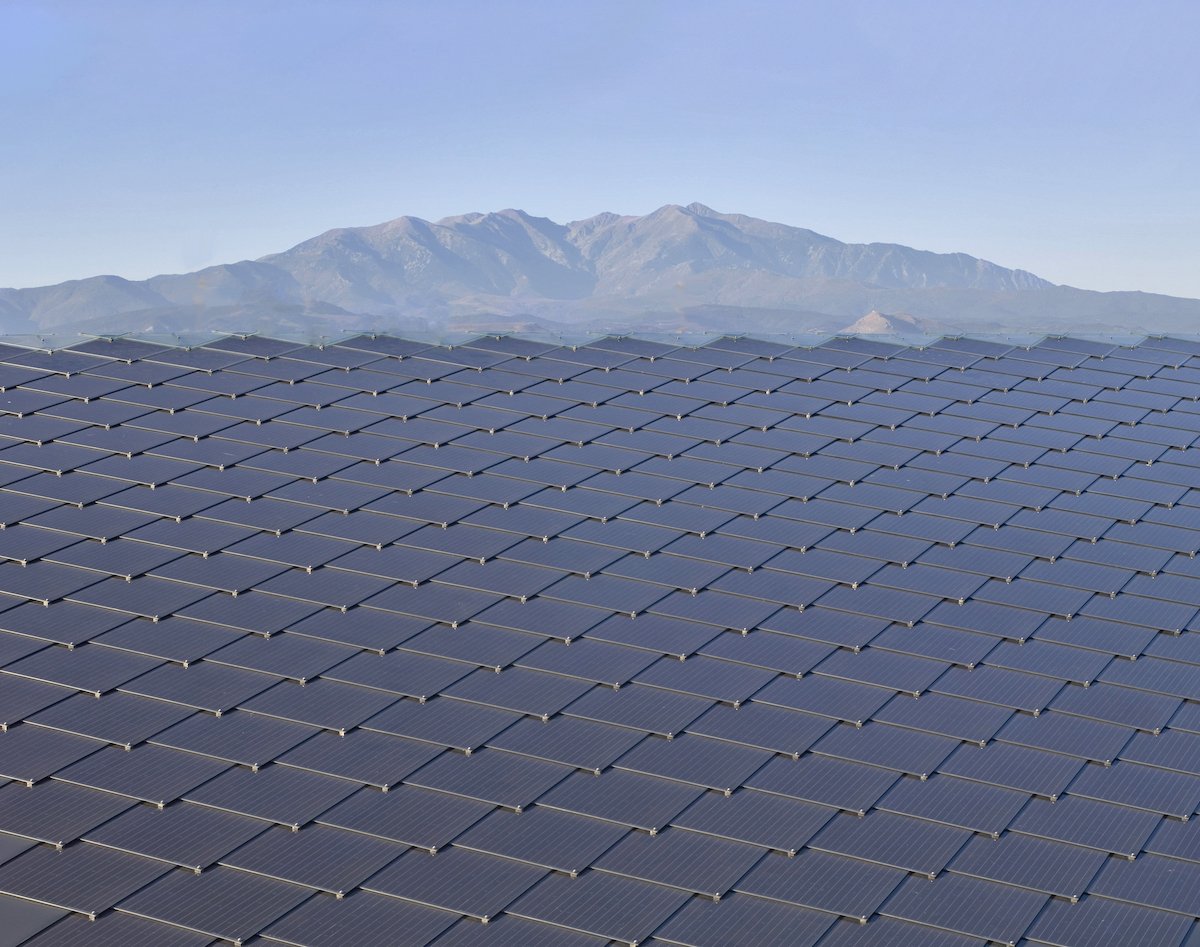 How do solar shingles work