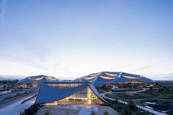 A view of the Bay View campus with the events center in the foreground and a Google brandmark sculpture. Dragonscale | SunStyle