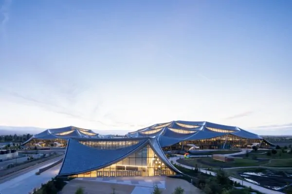 A view of the Bay View campus with the events center in the foreground and a Google brandmark sculpture. Dragonscale | SunStyle