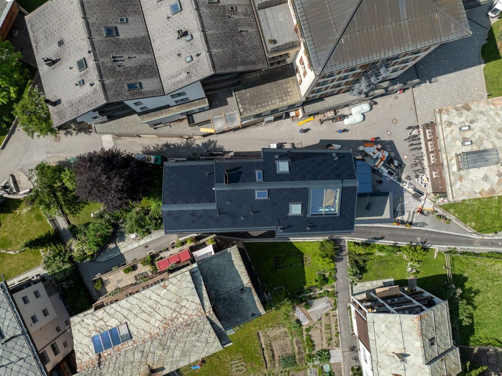 Hotel Tannenhof, Zermatt – SunStyle solar roof blending seamlessly with traditional alpine architecture.