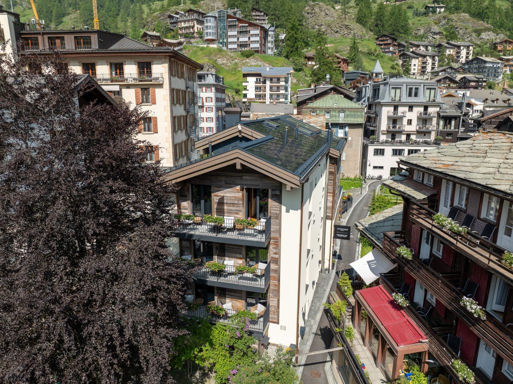 Hotel Tannenhof, Zermatt – SunStyle solar roof blending seamlessly with traditional alpine architecture.