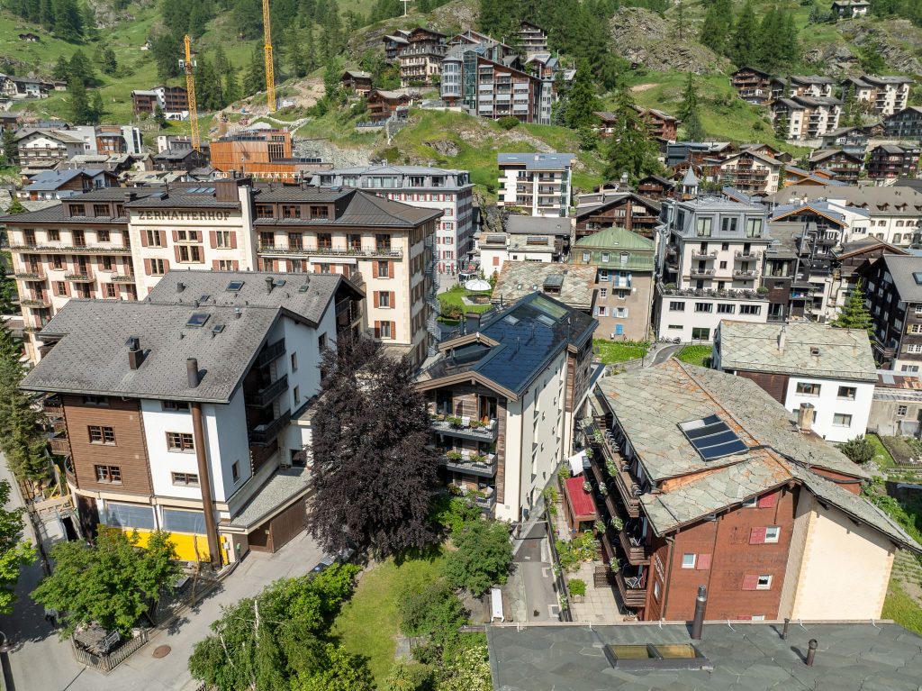 Hotel Tannenhof, Zermatt – SunStyle solar roof blending seamlessly with traditional alpine architecture.