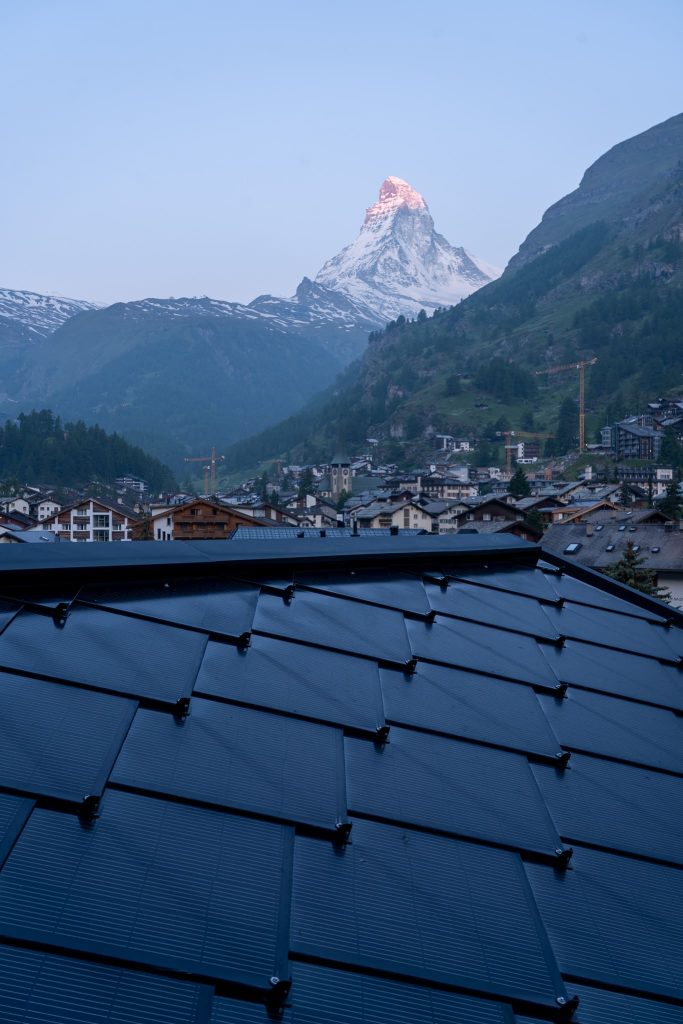 SunStyle solar roof on Hotel Welschen, Zermatt – a staged roof design blending tradition with renewable energy.