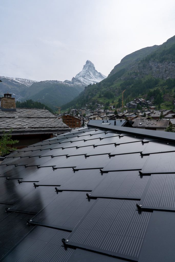 SunStyle solar roof on Hotel Welschen, Zermatt – a staged roof design blending tradition with renewable energy.